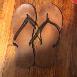 Clark’s flip flops